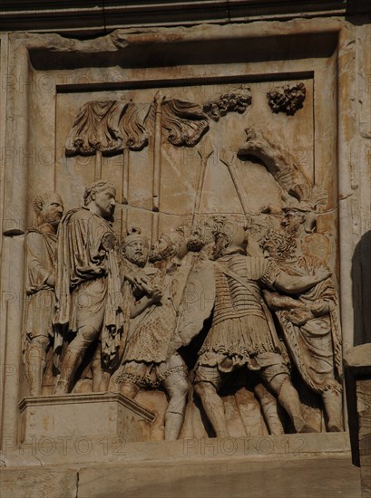 Arch of Constantine. Panes form an earlier monument to Marcus Aurelius.