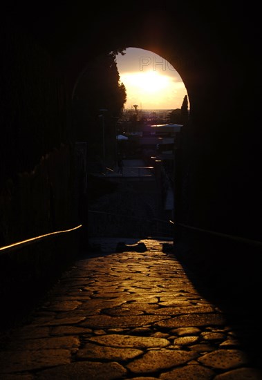 Pompeii. Sunset on a cobbled street.