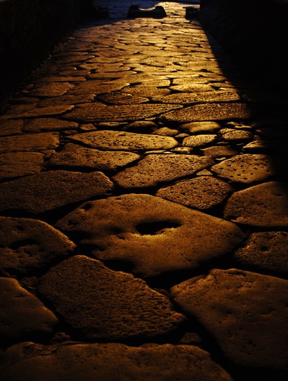 Pompeii. Sunset on a cobbled street.