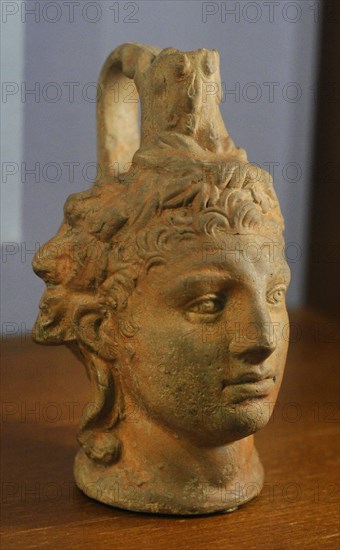 Figured vessel: Head of young Heracles.