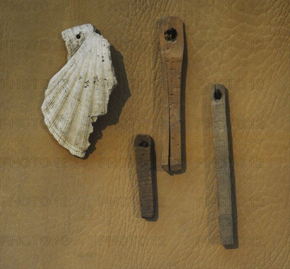 Rune pins, wooden amulets.