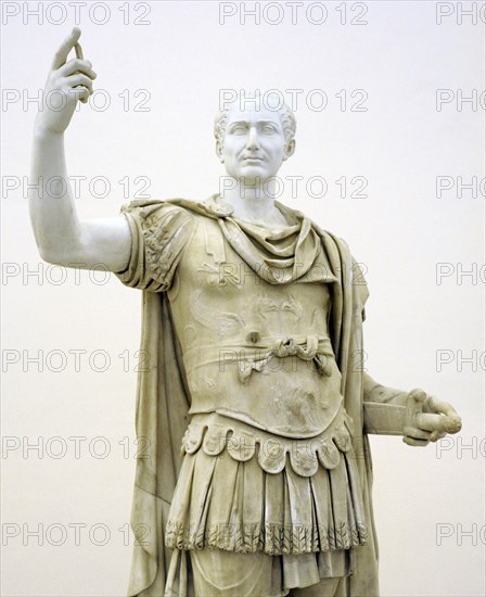 Figure in miliary uniform, with a modern head of Julius Caesar.