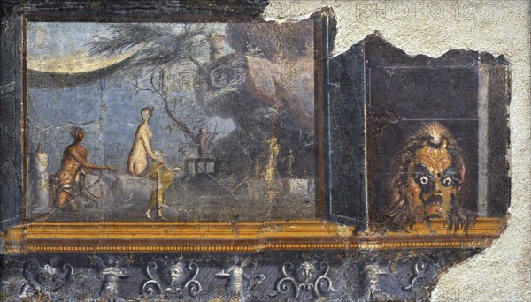 Panel with doors with a mask of Silenus.