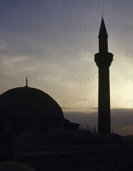 Syria. Aleppo. Mosque. Sunset. photo before Syrian Civil War