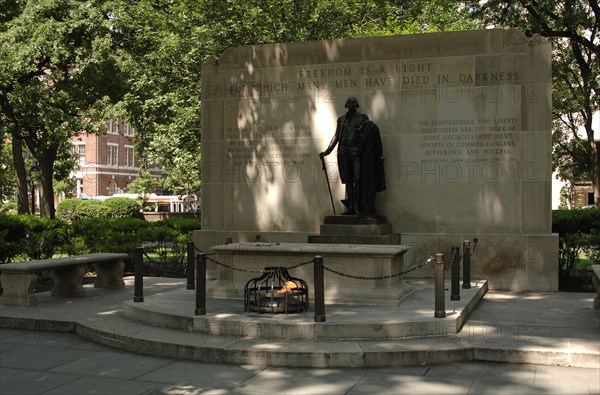 Tomb of the Unknown Revolutionary War Soldier and statue of George Washington.