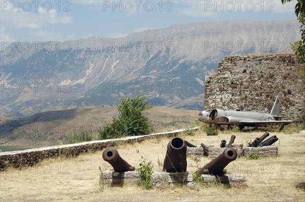 Cannons and American Air Force plane that landed in Albania in 1957 during the Cold War.