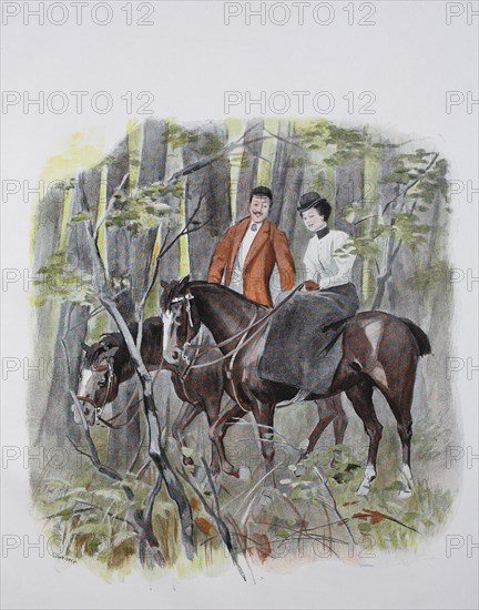 Couple rides on horses in the forest