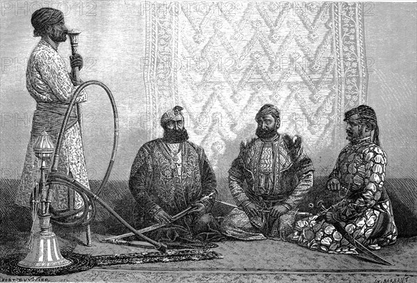 Men smoke hookah in a tea house in Hindustan