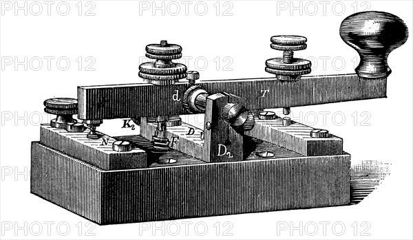 A telegraph key is a switching device used primarily to send Morse code  /  Ein Telegraphenschlüssel ist ein Schaltgerät