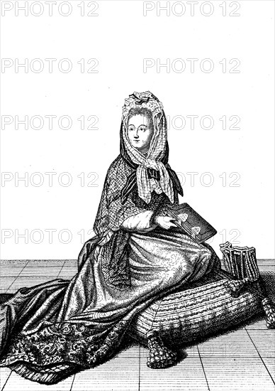 Noble lady with prayer book in church