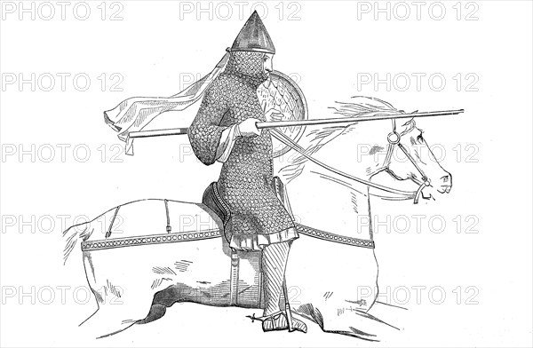 French knight of the 12th century with long tunic and pointed helmet