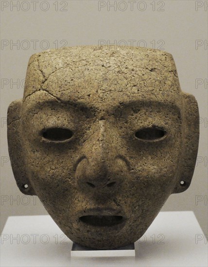 Mask depicting a human face