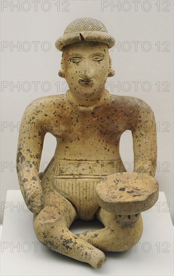 Sitting human figure, Colima style