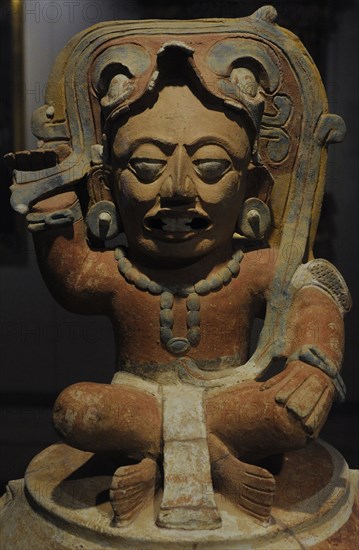 Funerary urn with depiction of the solar god Kinich Ahau