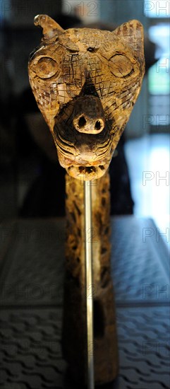 Animal-head post carved in wood