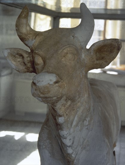 Pottery depicting a bull with cuneiform inscriptions