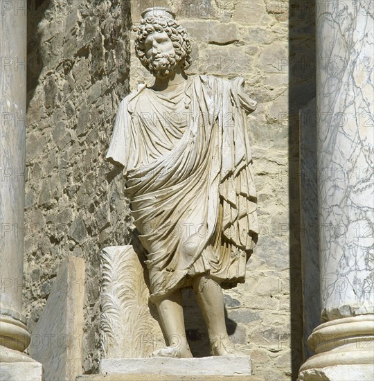 Scene of the Roman theater with a copy of a statue of the God Pluto