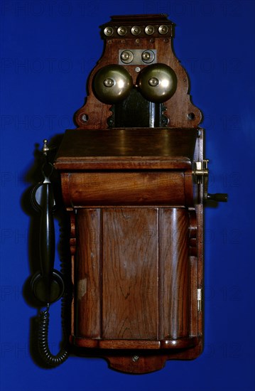 Manual telephone switchboard with handset.