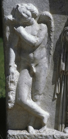 Relief depicting Cupid with torch.