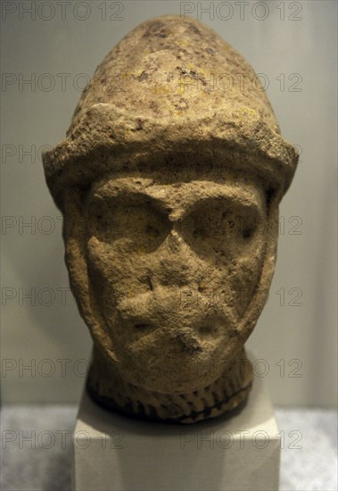 Head of a knight figure.