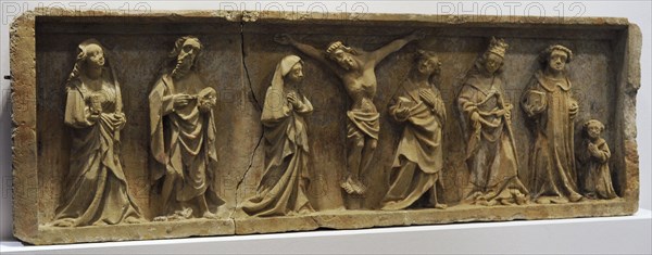 Retable. Crucifixion with Saints and a donor.