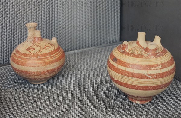 Mycenaean vessels. Small stirrup jars.