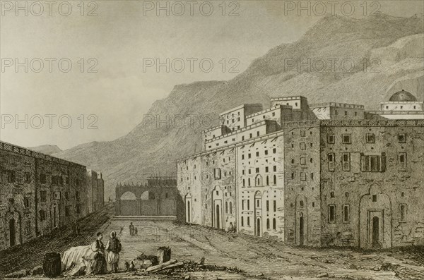 Sacred place formed by three arches on a street in Mecca.