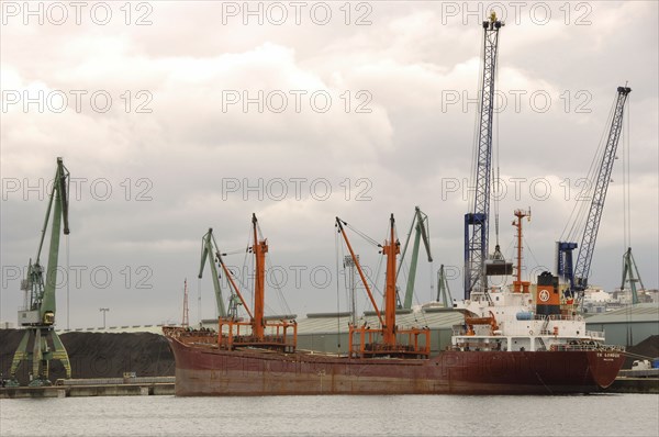 Commercial port. Cranes.