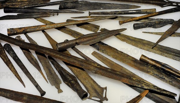 Set of bronze weapons thrown into the water as offerings