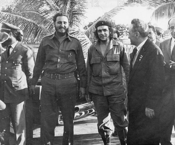 Cuban Premier Fidel Castro (left), Ernesto 'Che' Guevara, Cuban National Bank President (center), and Soviet First Deputy, Premier, Anastas Mikoyan (right) are shown together in the garden of the house that the Cuban government put at Mikoyan's disposal during his visit to the Latin American country. Havana, Cuba, 1960.