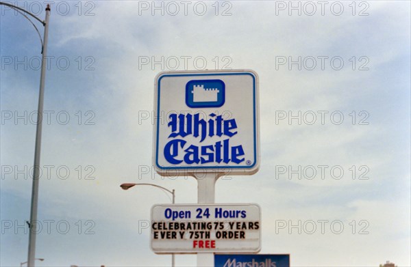 White Castle restaurant sign in Chicago south suburbs, sign celebrates their 75th anniversary circa 1996.