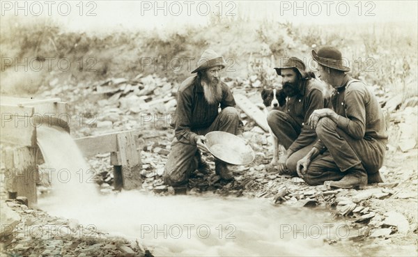 We have it rich.' Washing and panning gold, Rockerville, Dak. Old timers, Spriggs, Lamb and Dillon at work.