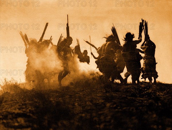 Edward S. Curits Native American Indians - Dancing to restore an eclipsed moon circa 1914.