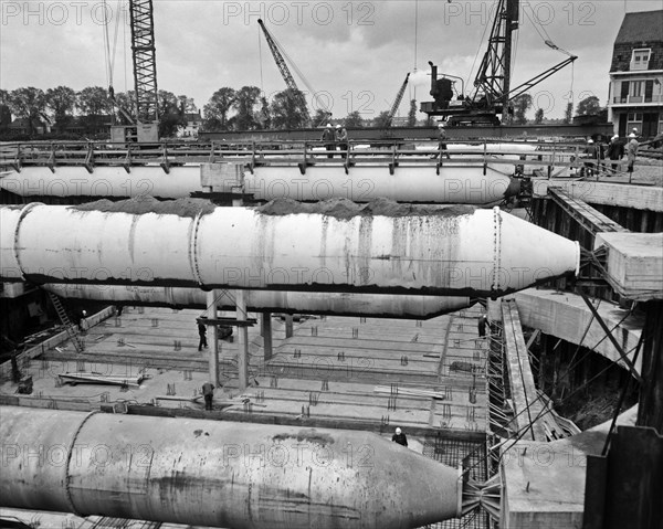 Construction of the IJtunnel or Construction of the Coen Tunnel (unidentified specific tunnel)  Date October 1, 1963 .