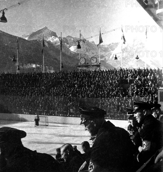 Nazi soldiers attending a hockey game in Germany circa 1930s or early 1940s.
