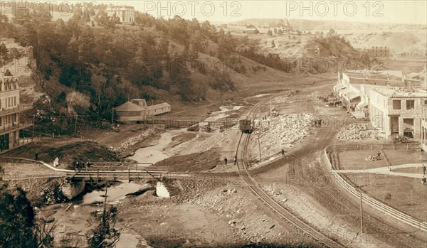 Hot Springs, S.D.' From the Fremont, Elkhorn and M.V. Ry. bridge looking north to Fred T. Evans residence and plunge bath 1891.