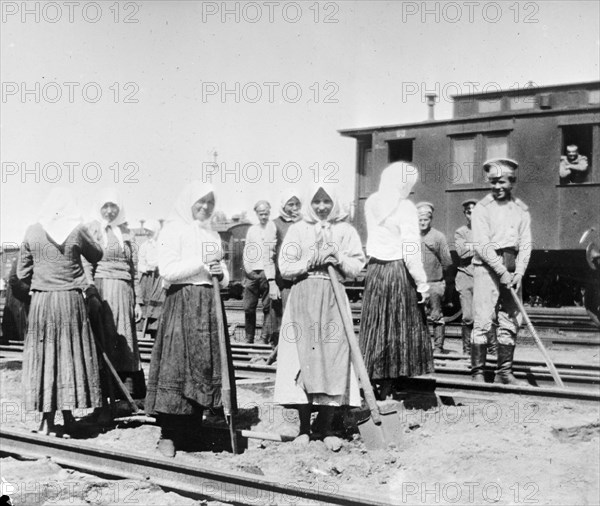 War in Russia - Russian Women in 1917 near train .