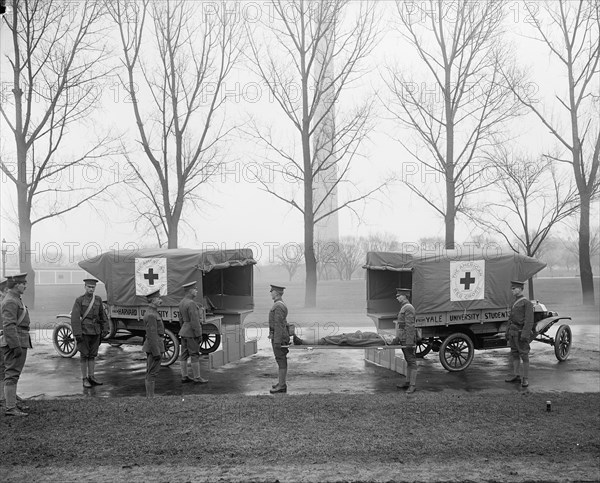 Red Cross ambulance, workers, patients demonstration circa early 1900s .