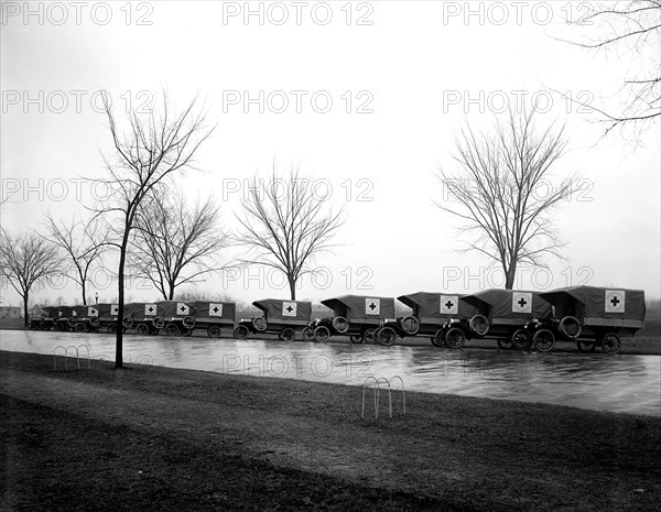 Red Cross ambulances circa early 1900s .