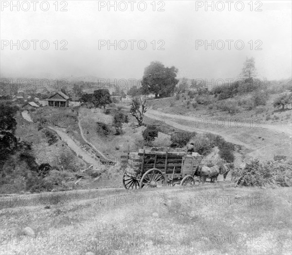 California History - Hydraulic Mining - hauling Sluice Blocks, for the Blue Gravel Claim, Smartsville, Nevada County circa 1866 .