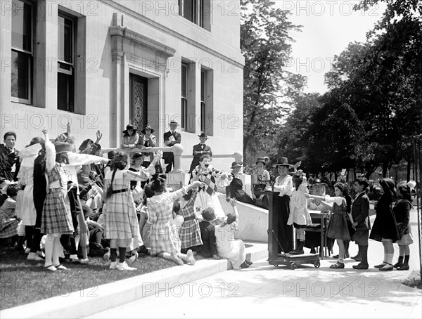 Cho-Cho, the Health Clown entertaining children circa 1919 .