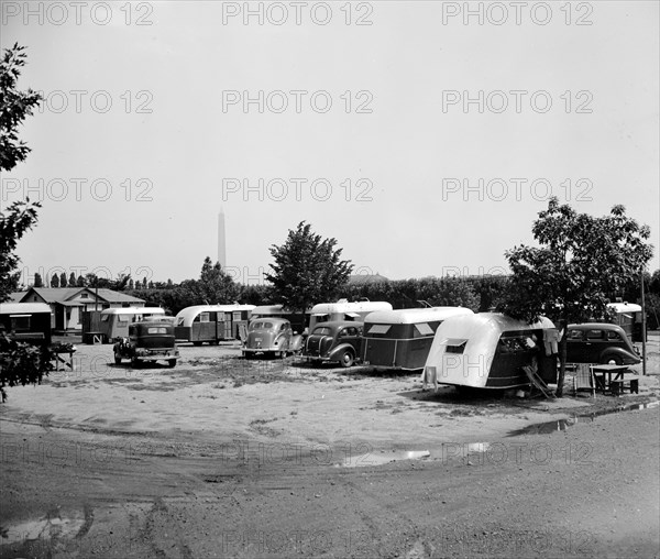 Washington D.C. area trailer camp, parked trailers and cars circa 1937.