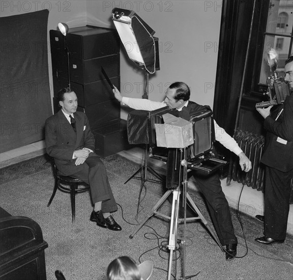 January 7, 1938 - Edsel Ford, auto magnate, poses for the Harris-Ewing photographer just before he is questioned by the Senate Rail Investigating Committee.