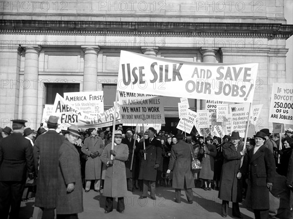 January 28, 1938 - Members of the American Federation of Hosiery Workers arriving today at Union Station today from they staged a parade to the White House as a protest against the boycott of Japanese silk.