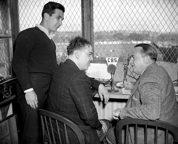 Columbia Broadcasting System. Arch McDonald, Warren Sweeney, and helpers at ball park, 4/19/38.