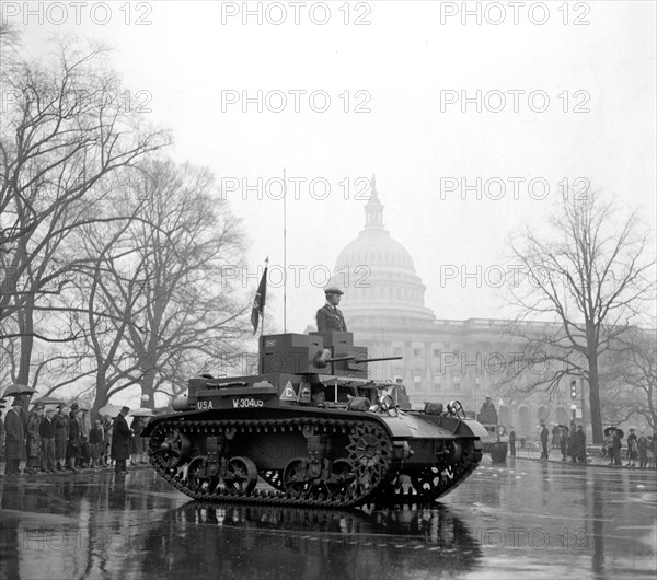 Latest types of tanks rumble past The Capitol in Annual Army Day Parade in Washington D.C. circa April 6, 1939.