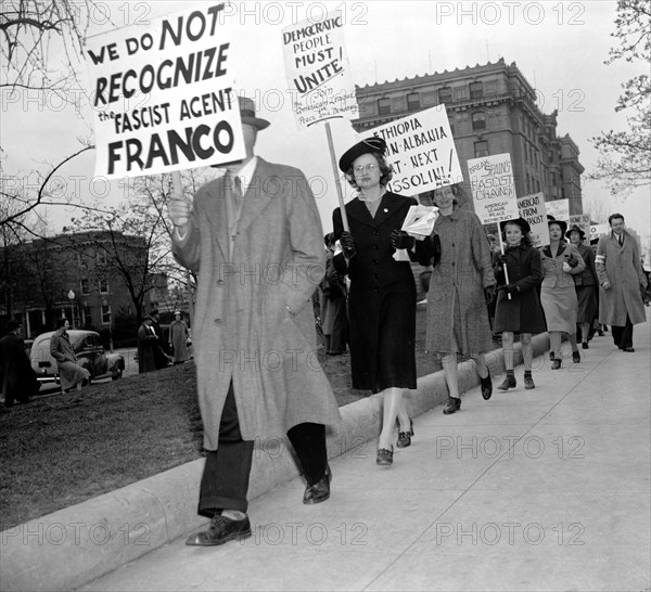 Representatives of the Washington branch of the American League for Peace and Democracy took up signs today and picketed the Italian Embassy circa April 8, 1939.