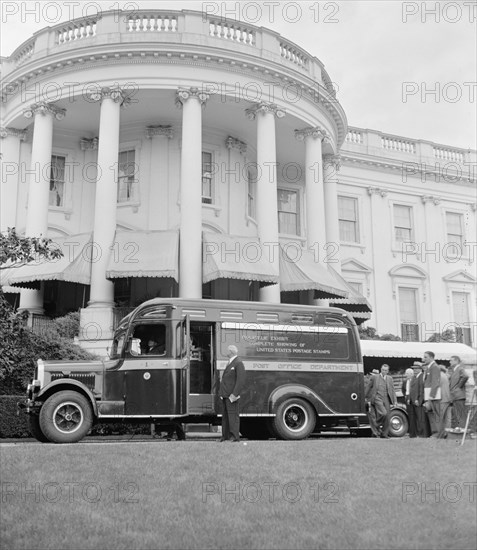 James A. Farley and new philatelic truck at White House. The Post Office's new philatelic stamp truck will begin a tour of the United States today following ceremonies at the White House circa 1939.