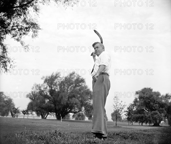 Secretary of Agriculture Henry A. Wallace is boomerang throwing. He practices daily with a number of his cronies in Potomac Park and has become quite adept in the handling of the weapon which was originated by the Australian Aborigines circa 1939.