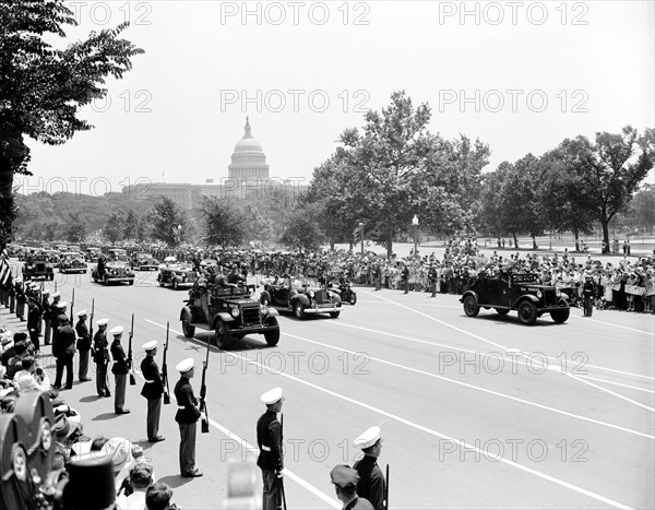 King and Queen of England (Great Britain) in an automobile visiting Washington D.C. circa 1938 or 1939 .